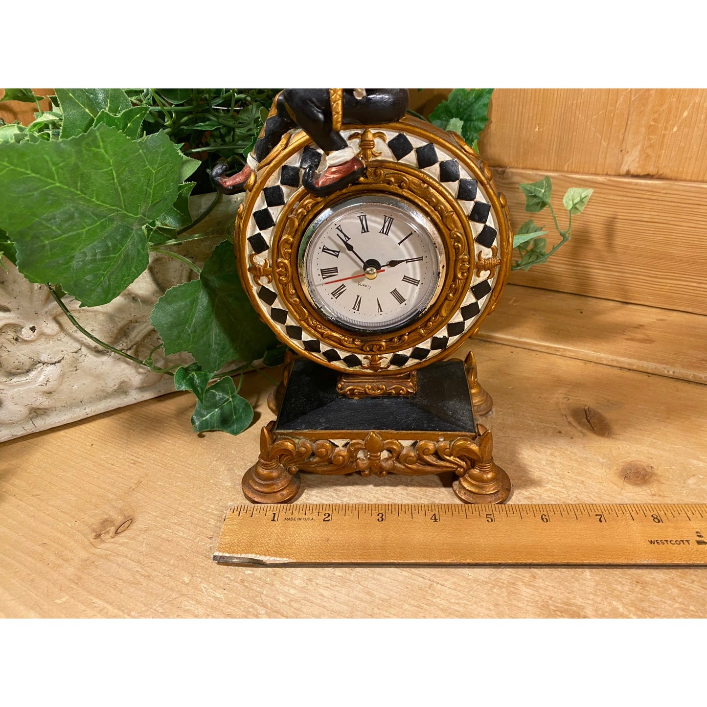 Vintage Harlequin Jester Mantle Clock | Quartz Clock with Ceramic Surround | Gold, Black, White | Jester Figure Sitting On A Pedestal Clock