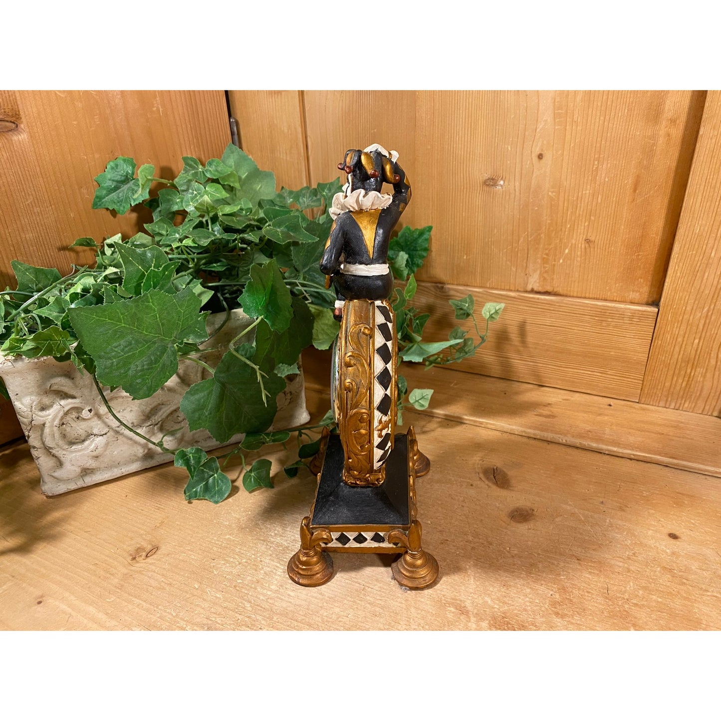 Vintage Harlequin Jester Mantle Clock | Quartz Clock with Ceramic Surround | Gold, Black, White | Jester Figure Sitting On A Pedestal Clock
