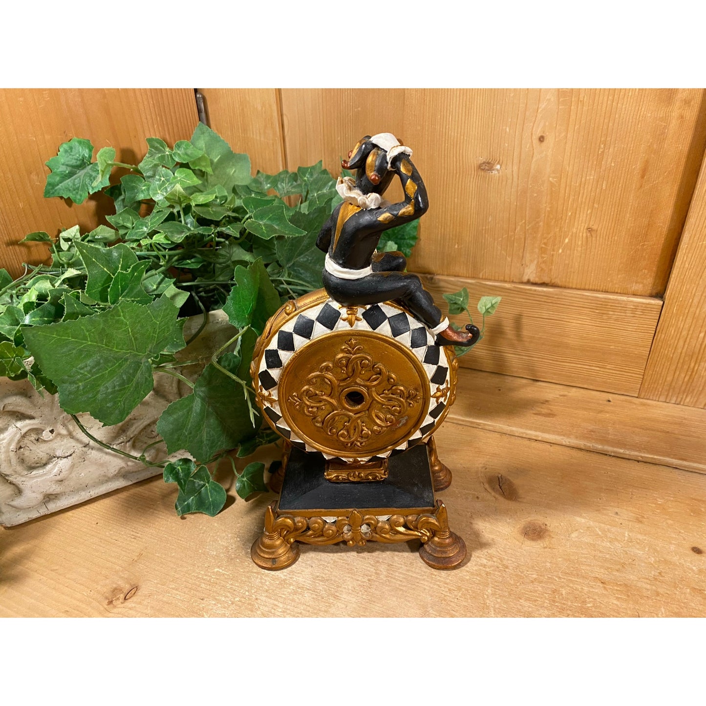 Vintage Harlequin Jester Mantle Clock | Quartz Clock with Ceramic Surround | Gold, Black, White | Jester Figure Sitting On A Pedestal Clock