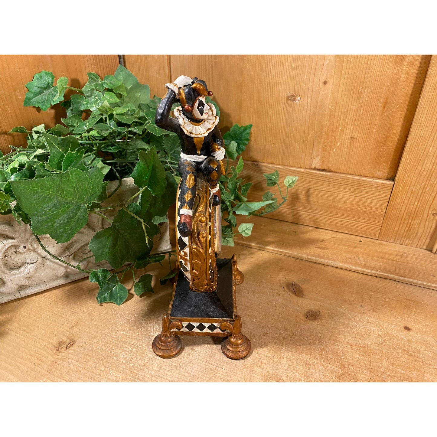 Vintage Harlequin Jester Mantle Clock | Quartz Clock with Ceramic Surround | Gold, Black, White | Jester Figure Sitting On A Pedestal Clock
