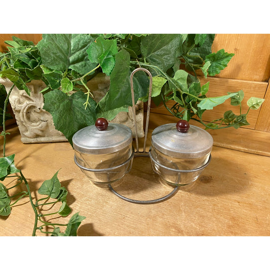 Vintage Condiment Caddy | Midcentury Modern Condiment Serving Set | Two Glass Jars with Aluminum Tops and Colored Knobs On A Metal Stand